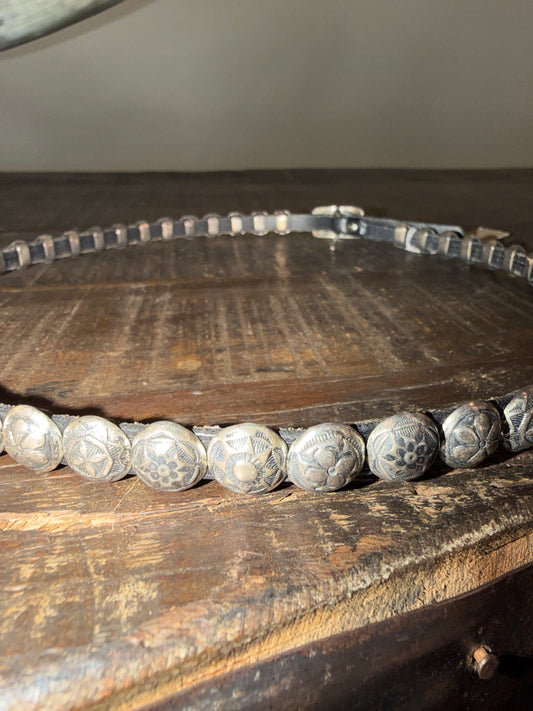 Multi Round Stamped on Black Leather