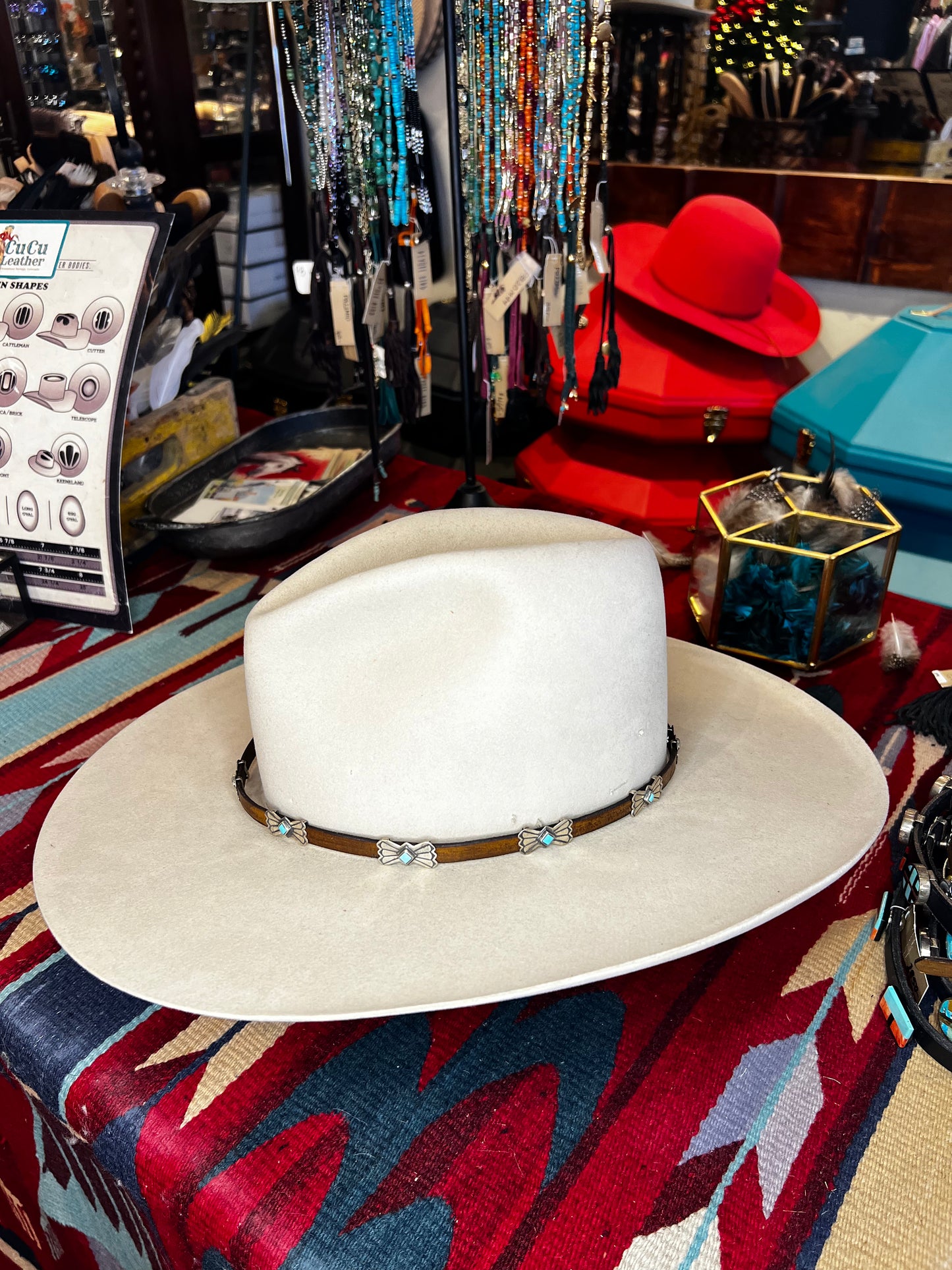 Turquoise Bowties on Brown Leather