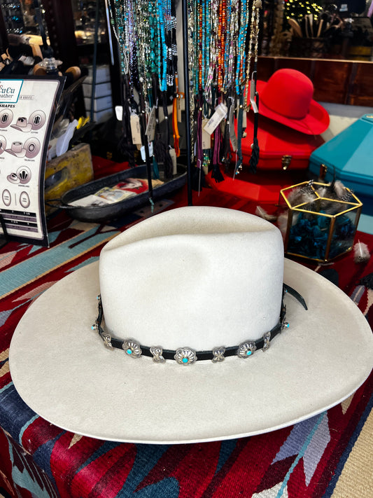 Conchos and Bowties on Black Leather